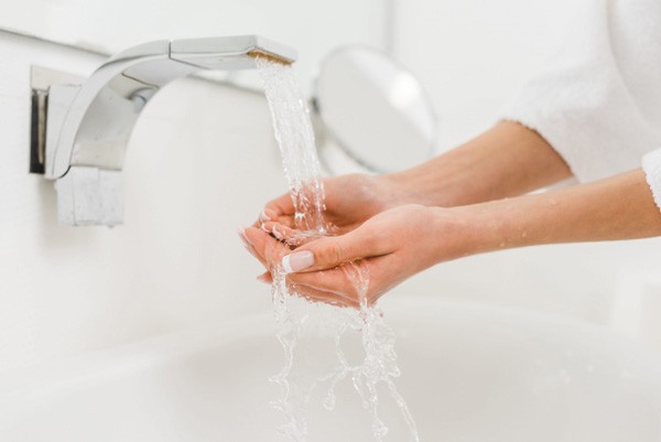 Woman washing her hands 