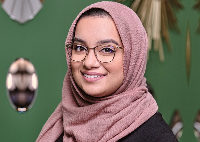 Woman wearing brown glasses