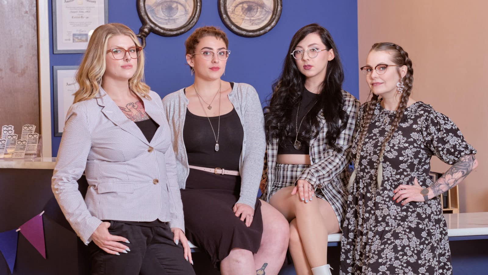careers-at-eyes-on-trade-header-bg Woman wearing brown glassess